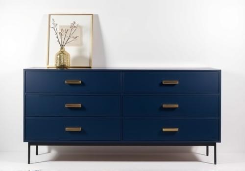 After: A chic, navy blue and gold statement dresser, a perfect vintage furniture makeover.